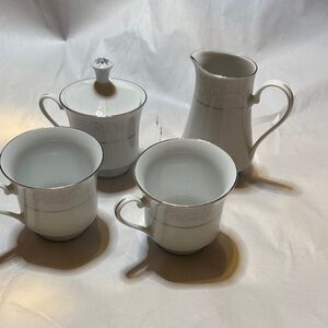 Elegant White and Silver Tea Set